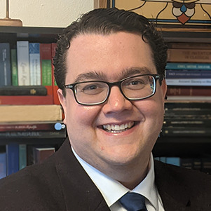 A photograph of the author, Evan Dutmer.